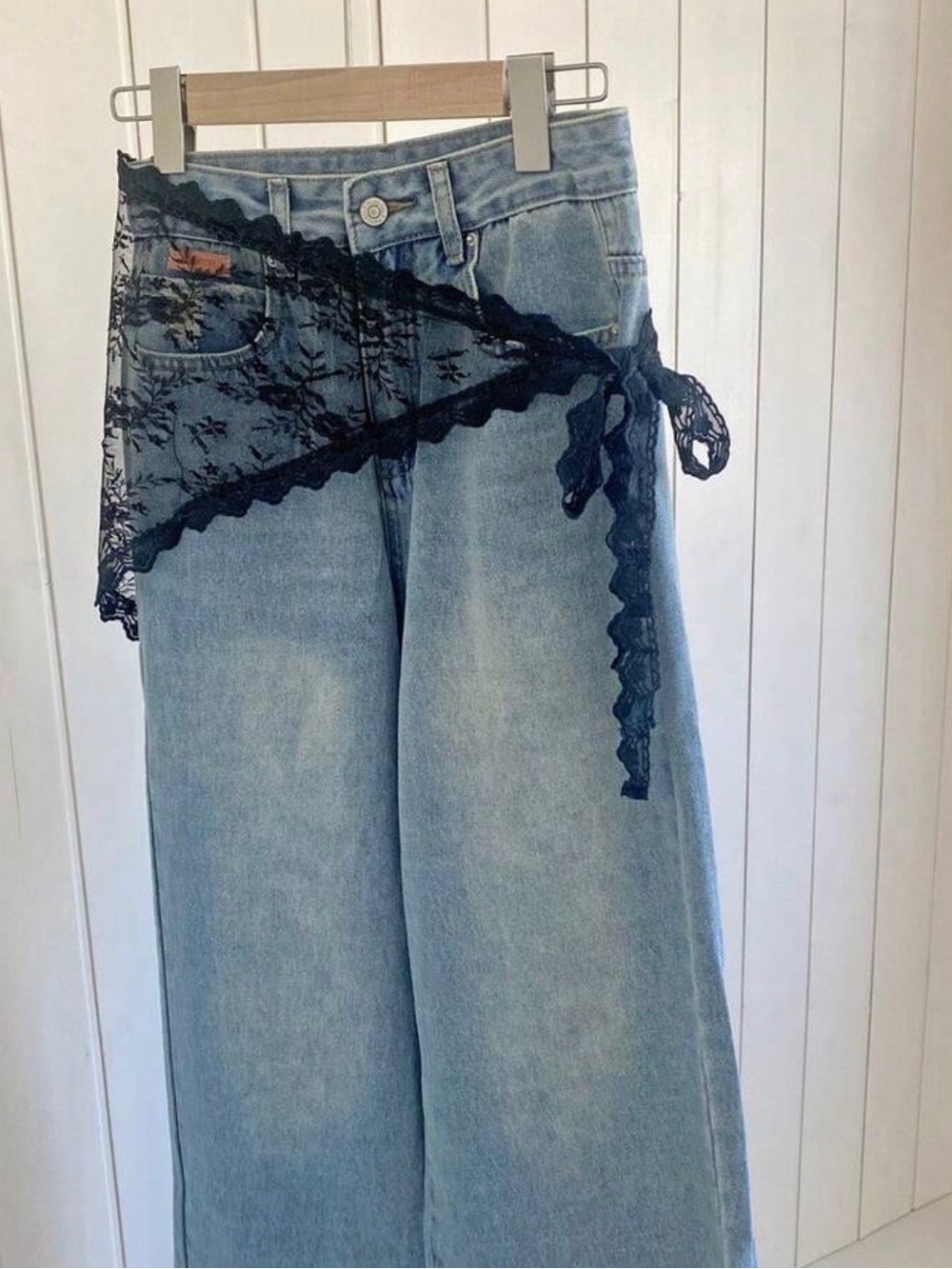 Light Blue Wide-Leg Jeans with Black Lace Wrap Detail